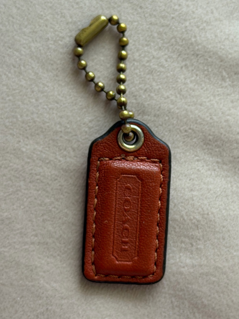 COACH Small Orange Leather Hangtag🧡